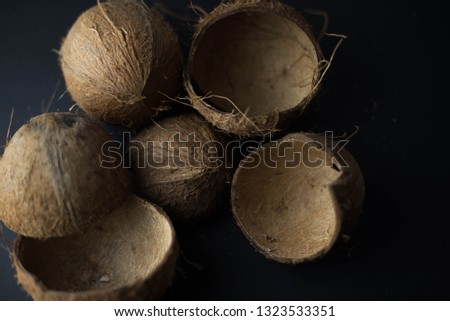 Coconut shell on black background