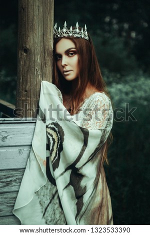 Girl posing with moth wings