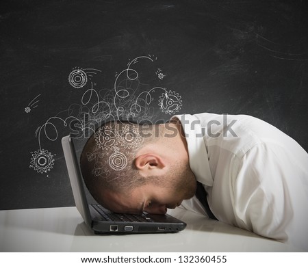 Concept of stress with businessman sleeping on a laptop Royalty-Free Stock Photo #132360455