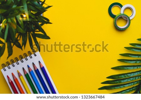  yellow background green notebook 