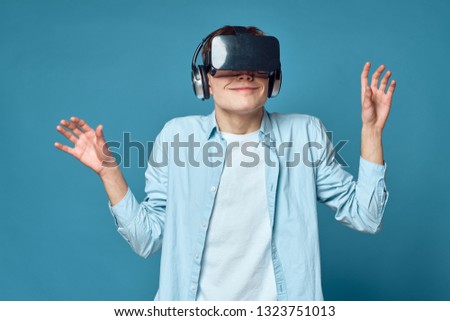   man in 3d glasses on a blue background                             