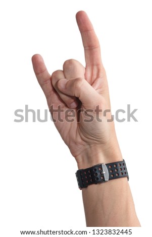 Hand on the white background shows a goat
