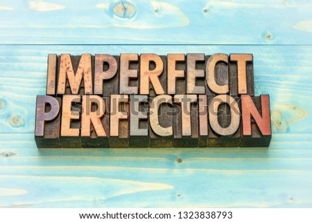 imperfect perfection word abstract in vintage letterpress wood type prinitng blocks