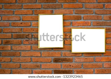 White poster or a white picture frame hanging on the brick wall background