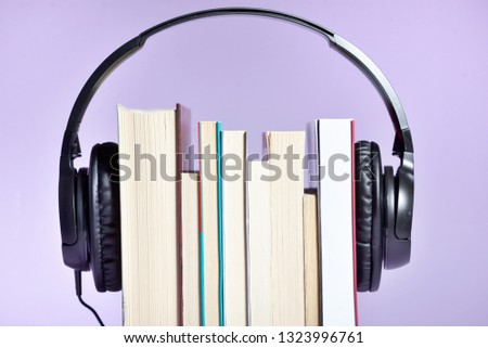 Audio books concept with books and headphones