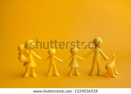 Yellow family figure with cat on yellow background