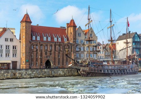 Mariacka Gate and a vintage pirate ship in the Motlawa, Gdansk