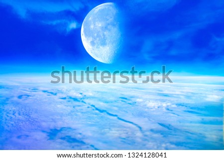 Dramatic Nighttime Clouds and Sky With Large Full Moon