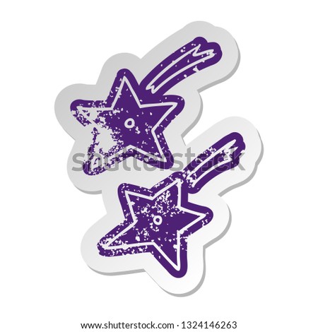 distressed old cartoon sticker of ninja throwing stars