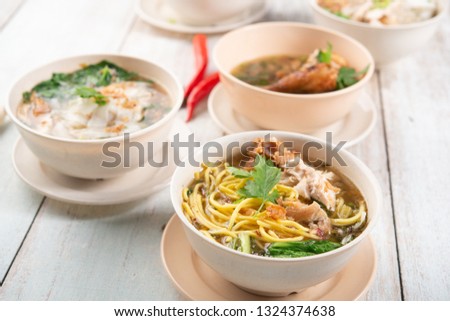Various Southeast Asian dishes, noodles and soup.
