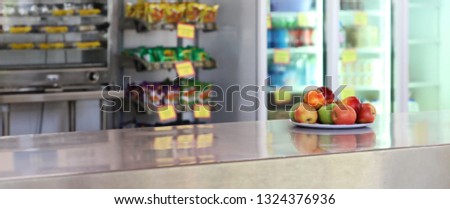 plate of fresh healthy fruit options as part of a healthier school canteen. Fighting childhood obesity and weight issues in education.  Royalty-Free Stock Photo #1324376936