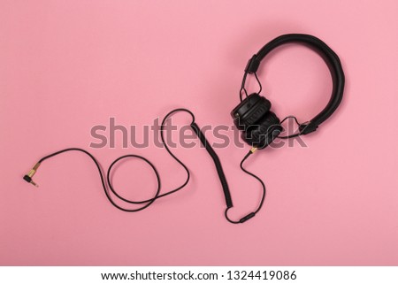 Top view. Flat lay. Copy space. Trendy colorful photo. Minimal style with colorful paper backdrop. Music concept