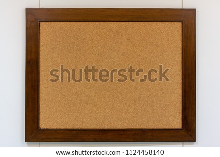Wood Frame on brown cock wood surface for sticky notes in office texture background