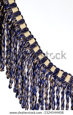 interior design bullion fringe for curtains soft furnishings displayed in a hotel room no people stock photo