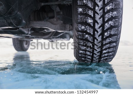 Winter tyres in extreme cold temperature Royalty-Free Stock Photo #132454997