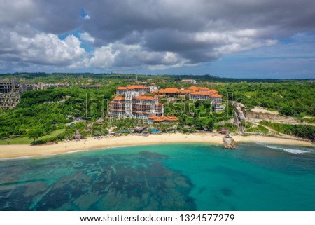 Aerial view of Nusa Dua coast - white beach, beautiful hotels and blue ocean, Bali, Indonesia,