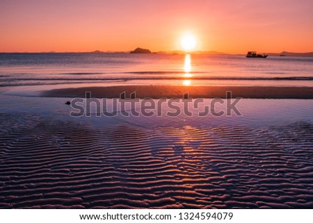 scenery of seascape there is reflection of sun ray on the sea and dune sand,koh yao yai,Phang nga,Thailand