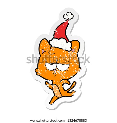 bored hand drawn distressed sticker cartoon of a cat wearing santa hat