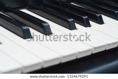 Close up piano keyboard for background purpose.