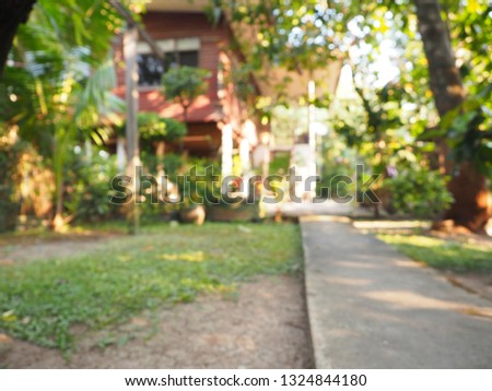 Abstract blur House and tree for background, Blur image of Natural House, Abstract blur and defocused 
walkway of house.