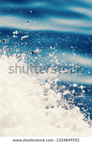 Ocean wave surface, crashing wave with foam on its top