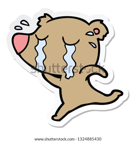 sticker of a cartoon crying bear