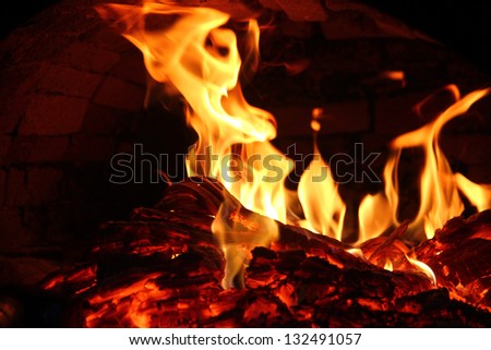 Old brick furnace with hot fire inside