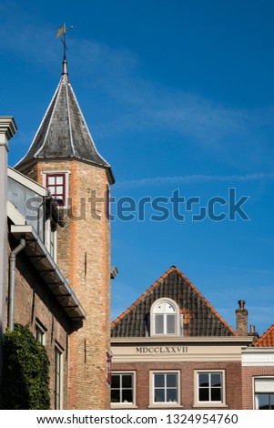 tower in street called Petersbrug, Dordrecht, The Netherlands