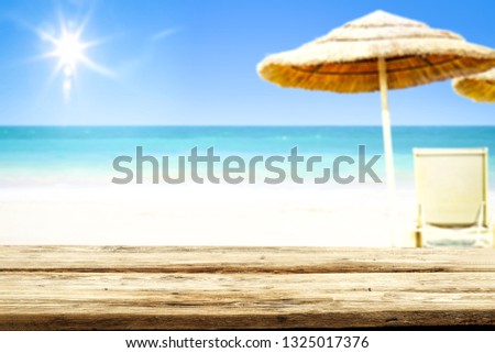 Desk of free space and beach landscape 