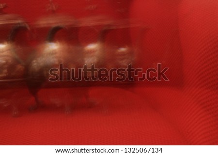 Blurred red abstract vintage tea pot