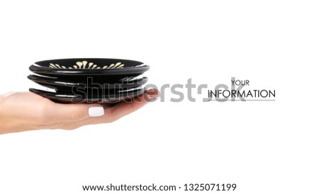 Black saucers in hand pattern on a white background isolation