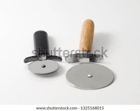 kitchen hand tools on white ground