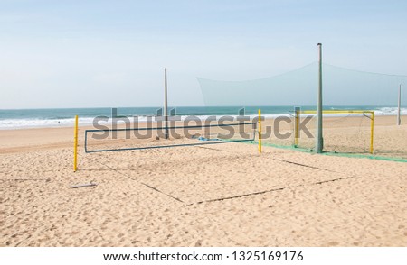 volleyball net stretched on a large beach