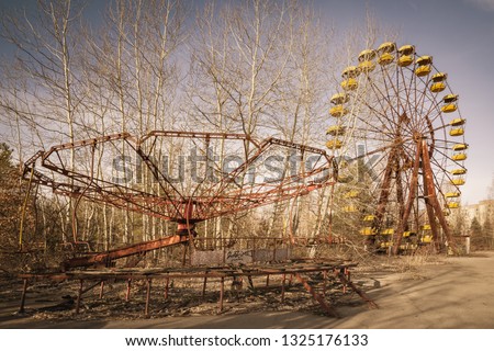 Abandoned amusement park in the center of the city of Pripyat, in Chernobyl Exclusion Zone, Ukraine Royalty-Free Stock Photo #1325176133
