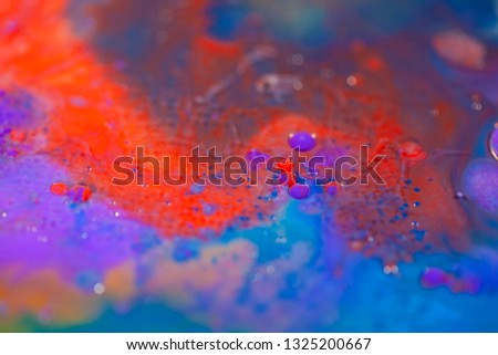 Abstract photography, bubbles floaring in acrylic paint, picture for creative wallpaper or design art work.