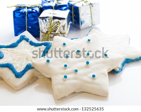 Gourmet cookies decorated with white icing for Hanukkah.