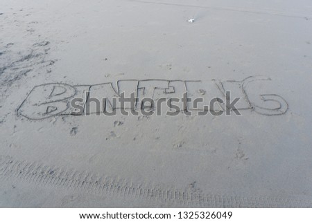 writing on beach sand intended for someone