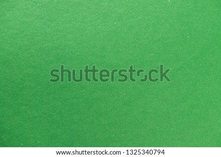 Green cardboard sheet paper texture background