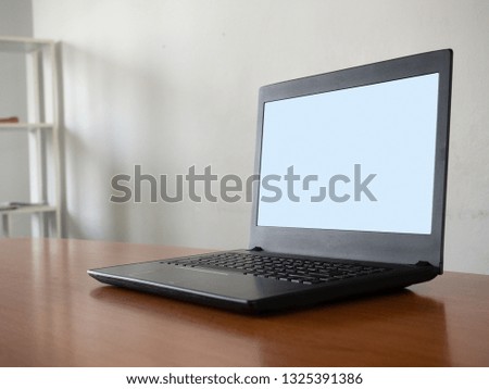 laptop computer blank screen on work table.(Work place concept)
