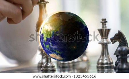 Military defence strategy and warfare cost management Abstract Background, withblue planet earth, focused on India and Pakistan on the map,  Elements of this image furnished by NASA.