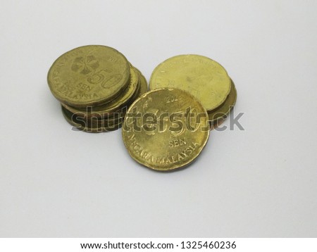 Coin stacked on each other over on white background