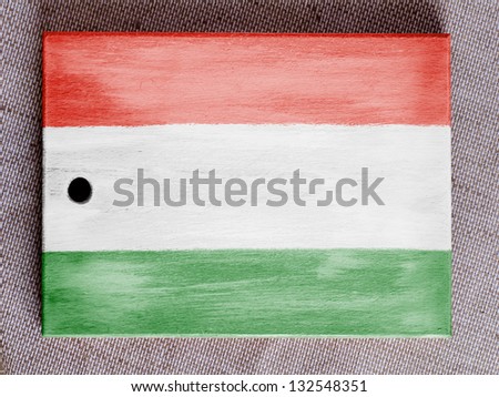 Hungary. Hungarian flag  painted over wooden board