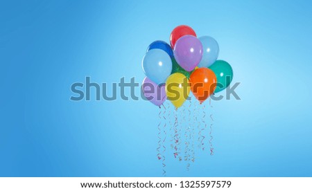 Many bright balloons floating on color background. Space for text