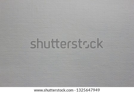 Paper texture background of light craft material design. Pale grey white cloth pattern of paper of fabric canvas. Close up top view of greyish white surface backdrop with empty copyspace