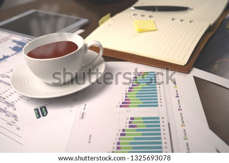 graph and calculator on the table for financial background