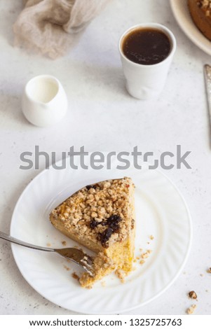Cheesecake with pumpkin and crumble. No crust cheesecake. Healthy dessert. Light concrete background. Copy space.