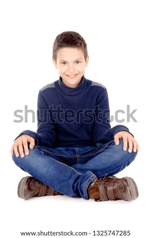 little boy posing isolated in white background