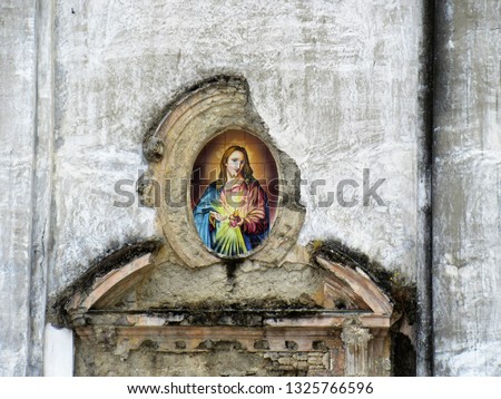 Amalfi Coast, Pimonte, detail of Christ on a ruined church facade