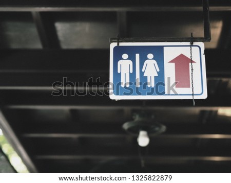 Bangkok ,Thailand - 2019 , January 24 : The picture of A sign to indicate that the way to the toilet at the floating market