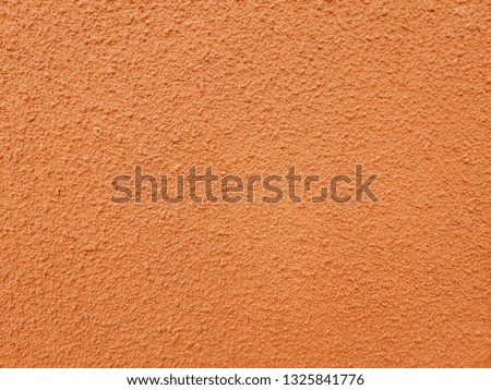 Orange wall background with rough surface.Abstract orange cement wall texture and background.Orange wall texture background, image vintage style for background.
